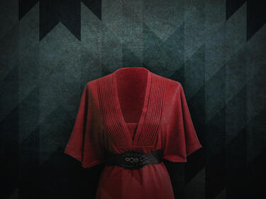 Black and Grey background with Red Dress in the middle