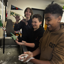 Boys having fun after art in class.