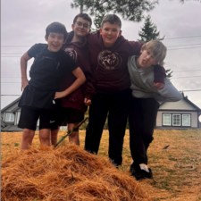 Boys cleaning up the grounds at CDGM